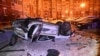 Оштетени автомобили во дворот на станбена зграда по, како што велат локалните власти, украинскиот напад во градот Белгород на 5 јануари 2023 година.