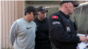 Do Kvon u pratnji crnogorske policije napušta zgradu Osnovnog suda u Podgorici dan nakon hapšenja, 24. mart 2023.