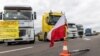 După fermieri, transportatorii polonezi protestează la granița cu Ucraina