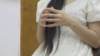Diana K., o casnică kârgâză în vârstă de 26 de ani, spune că a căzut victimă traficanților de sex.