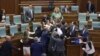 Përleshja fizike në Kuvendin e Kosovës më 13 korrik 2023. 