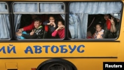 Copii evacuați din orașul ucrainean Kupiansk ocupat de ruși în mai 2022