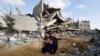 Urmările din Gaza ale unui atac al armatei Israelului. Cel puțin 34.388 de palestinieni au fost uciși și alți 77.437 au fost răniți în ofensiva militară israeliană. 