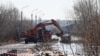РУСИЈА, КУРГАН - 15 АПРИЛ 2024: Мост Мало-Чаусовски преку реката Тобол