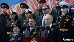 Russian President Vladimir Putin attends a military parade on Victory Day.