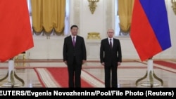 Претседателите на Кина и на Русија, Си Џинпинг и Владимир Путин