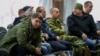 Reserviști ruși la un centru de recrutare de la Voljskyi, regiunea Volgograd r, 28 deptembrie 2022
