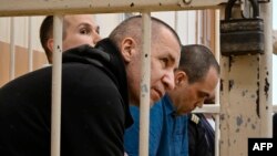 Avocații lui Navalnîi: Igor Sergunin, Alexei Liptser and Vadim Kobzev, la tribunalul din orașul Petușki, pe 12 septembrie.