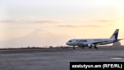 Armenia- The airplane of FlyOne Armenia in Zvartnotc,undated