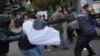 Tbilisi: Poliția „lichidează” corturile protestatarilor împotriva fraudării alegerilor parlamentare