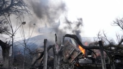 Fum la o bază antiaeriană de la Mariupol după un aparent bombardament rusesc, imagine de arhivă.