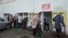Poverty, public kitchens in BiH, people in need waitng for meal.