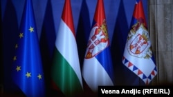 Serbia - Belgrade - State flags of Serbia and Hungary and EU flag 