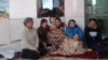 Women whose families face eviction from their houses hold a protest action in front of the government office in Astana on July 27.