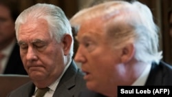 Рекс Тиллерсон и Дональд Трамп 