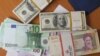 Dollarë, euro dhe valuta iraniane, rial