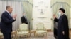 Șeful diplomației ruse Serghei Lavrov și președintele iranian Ebrahim Raisi, 22 iunie 2022