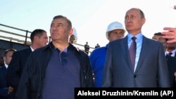 Президент России Владимир Путин и бизнесмен Аркадий Ротенберг