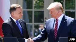 Președinții Donald Trump și Andrzej Duda la întîlnirea de la Casa Albă, 12 iunie 2019.