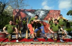 Azerbaijani enthusiasts of varzesh pahlavani perform during a celebration of the Persian New Year, known as Noruoz, in Baku.