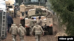 Imagine din timpul căutărilor la baza de pregătire sub egida NATO, din Lituania, unde 4 soldați americani au dispărut în timpul exercițiilor militare.
