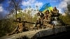 Ushtarët ukrainas në Liman, në Donjeck, që forcat e Kievit rimorën nga Rusia. 4 tetor 2022.