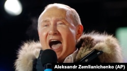 Владимир Путин на митинге после победы на президентских выборах 18 марта 2018 г.