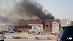 Stop cadru dintr-un video AFP cu fumul care se ridică după exploziile din capitala Qatarului, Doha, pe 9 septembrie 2025.