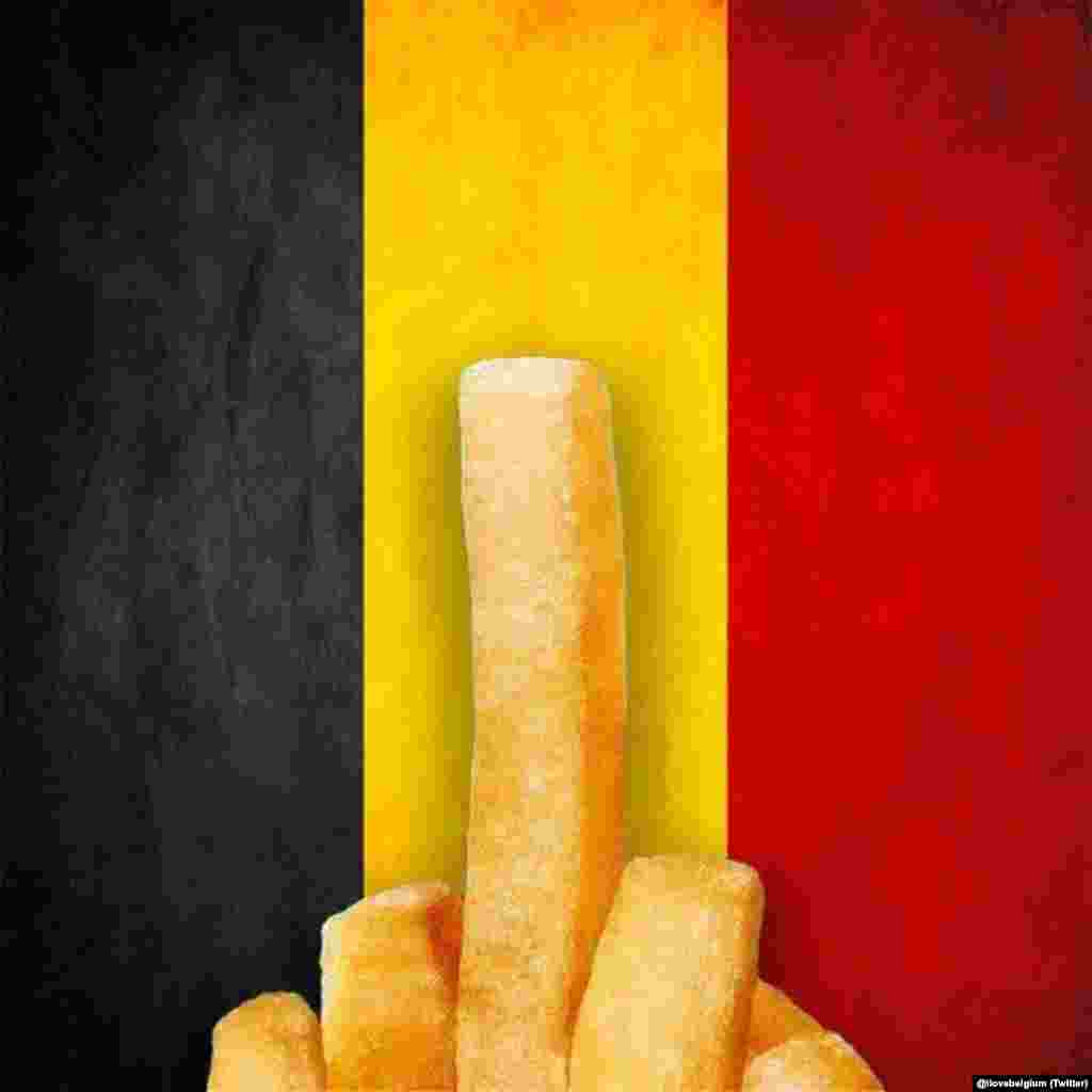 Në këtë karikaturë janë përdorur flamuri belg dhe patatinat tradicionale belge.&nbsp;