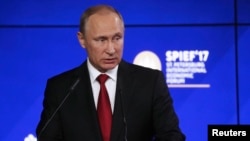 Russian President Vladimir Putin speaks at the St. Petersburg International Economic Forum on June 2.