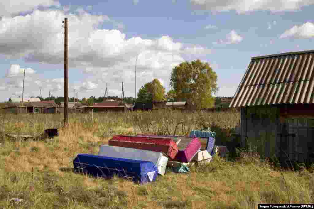 A pile of coffins at the ready. Families usually bury their dead by noon of the day following their death. &quot;People don&#39;t know what to eat and how to survive,&quot; Ismagilova says. &quot;They have been left here to die as guinea pigs.&quot;