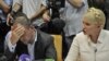 Юлія Тимошенко та її адвокат Сергій Власенко в залі Печерського суду, 24 червня 2011 року
