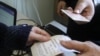 Reports Of Vote-Buying And Criminal Finances Cast Ominous Shadow Over Kyrgyz Elections