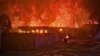 Pompierii sting incendiul provocat de un atac rusesc în regiunea Kiev, 9 iulie 2025.
