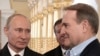 Володимир Путін (ліворуч) та Віктор Медведчук. 