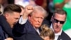 Trump scos de pe scenă de agenții Serviciului Secret.