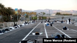 Las Vegas: un parcaj, transformat în adăpost pentru persoane fără casă, cu locurile marcate pentru a păstra distanța fizică necesară, pe timp de pandemie de coronavirs, aprilie 2020 