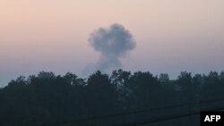 Një re tymi pas një sulmi me dronë në qytetin perëndimor të Ukrainës, Lviv, më 20 qershor.