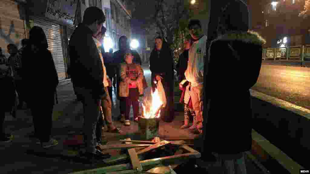 Some residents set up tents to spend the night outside and lit fires.