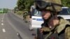 Бойовики угруповання «ДНР» блокують дорогу для проходу місії ОБСЄ до місця катастрофи «Боїнга-777», 30 липня 2014 року