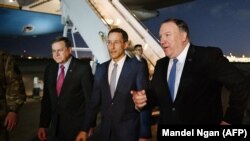U.S. Secretary of State Mike Pompeo (right) paid an unexpected visit to Baghdad last week. 