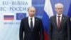 Владимир Путин и президент Европейского Совета Херман Ван Ромпей (справа) на саммите Европейский союз - Россия в Брюсселе, 21 декабря 2012