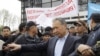 Kyrgyzstan -- Ousted President Kurmanbek Bakiev gestures before his intended address to supporters at a square in Osh, 15Apr2010