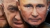 Маските на кои се претставени рускиот претседател Владимир Путин (десно) и шефот на Вагнер, Евгениј Пригожин, изложени на продажба во продавница за сувенири во Санкт Петербург, 4 јуни 2024