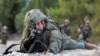 Soldat israelian în poziție de tragere în nordul regiunii Galileea, la 1 noiembrie 2023. (Foto: AFP) 