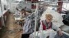Moldova, Young deaf graduates from vocational schools work in a textile factory in Chisinau founded by the Moldovan Association of the Deaf
