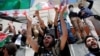 Demonstranti sa sirijskim i palestinskim zastavama u znak podrške Palestincima nakon molitve u Istanbulu, 14. maj