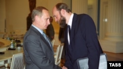 Президент Росії Володимир Путін і банкір Сергій Пугачов (праворуч), архівне фото, 2000 рік