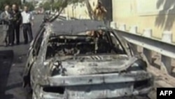 Одна из сгоревших у американской миссии машин