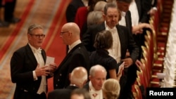 Premierul britanic Keir Starmer (primul din stânga) la Banchetul de Stat de la Windsor, miercuri seară. Joi îl va avea ca oaspete pe Trump la reședința sa de la țară.